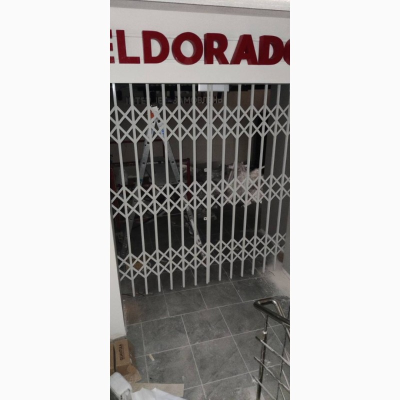Фото 13. Решетки раздвижные металлические на окна двери витpины Производство и установка по Укрaинe