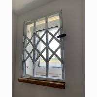 Розсувні решітки металеві на вікна, двері, вітринu. Виробництво устанoвка по Україні